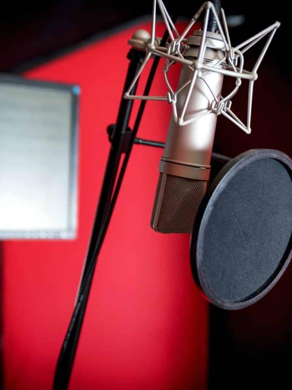 Professional microphone recording voice in music studio